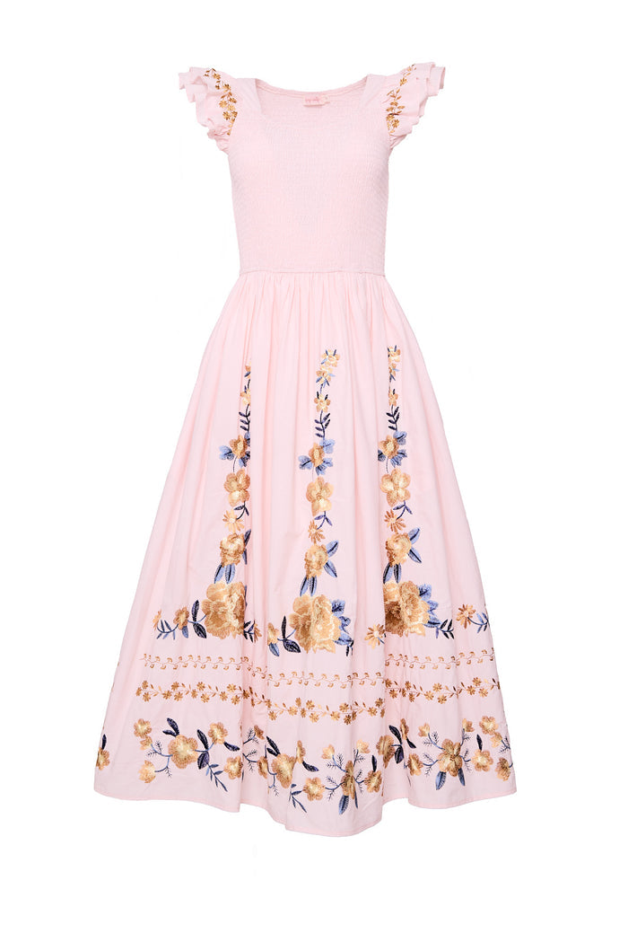 pink embroidered dress against a white background