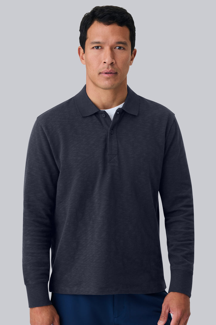 Front view of a man wearing Heavyweight Slub Long Sleeve Polo in Night Sky