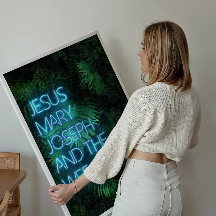 Jesus Mary Joseph Wee Donkey TV Quote Print held up against a living room wall