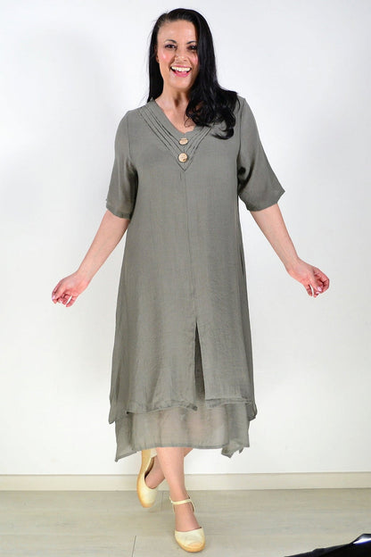 Khaki green La Mode summer tunic dress with short sleeves and a relaxed fit, displayed on a hanger.