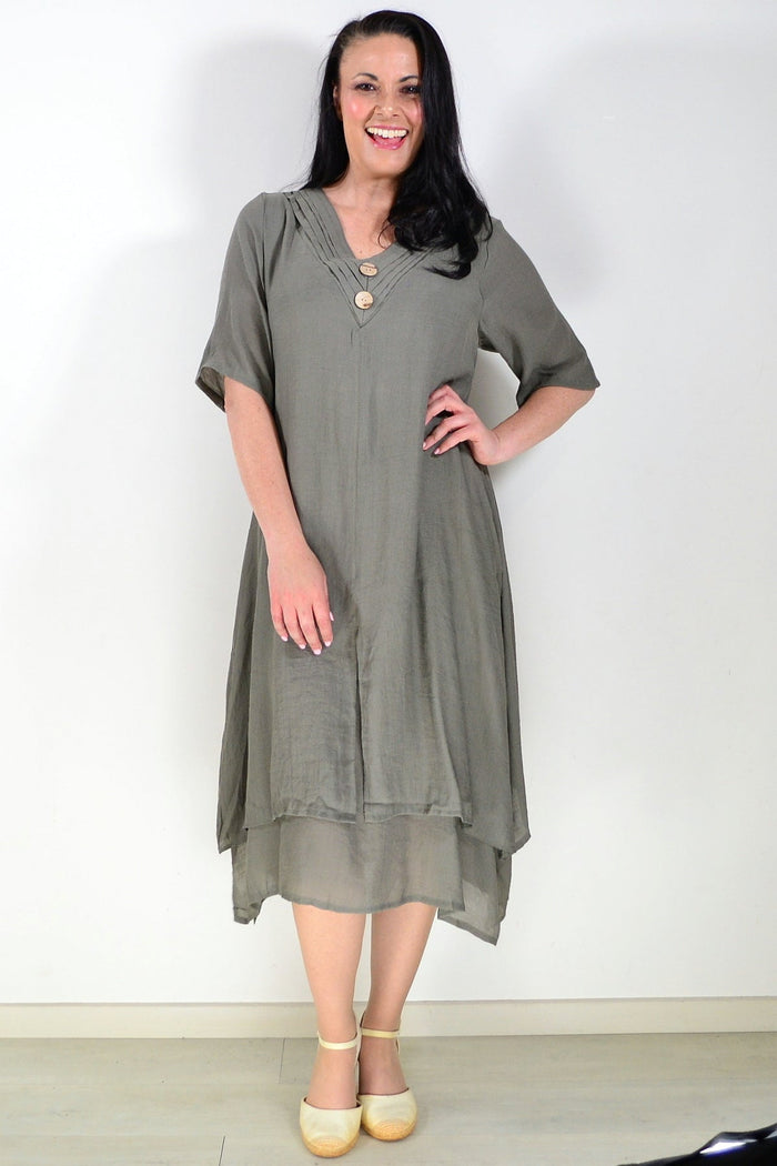 Khaki green summer tunic dress by La Mode, lightweight fabric with a relaxed fit and short sleeves, displayed on a hanger.