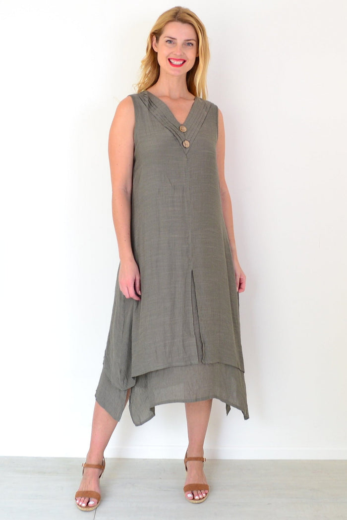 Khaki sleeveless coconut button tunic dress by La Mode, featuring a relaxed fit and stylish design, displayed on a hanger.