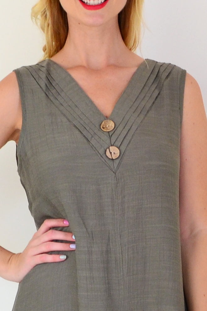 Khaki sleeveless coconut button tunic dress by La Mode, front view showing relaxed fit and coconut button details.