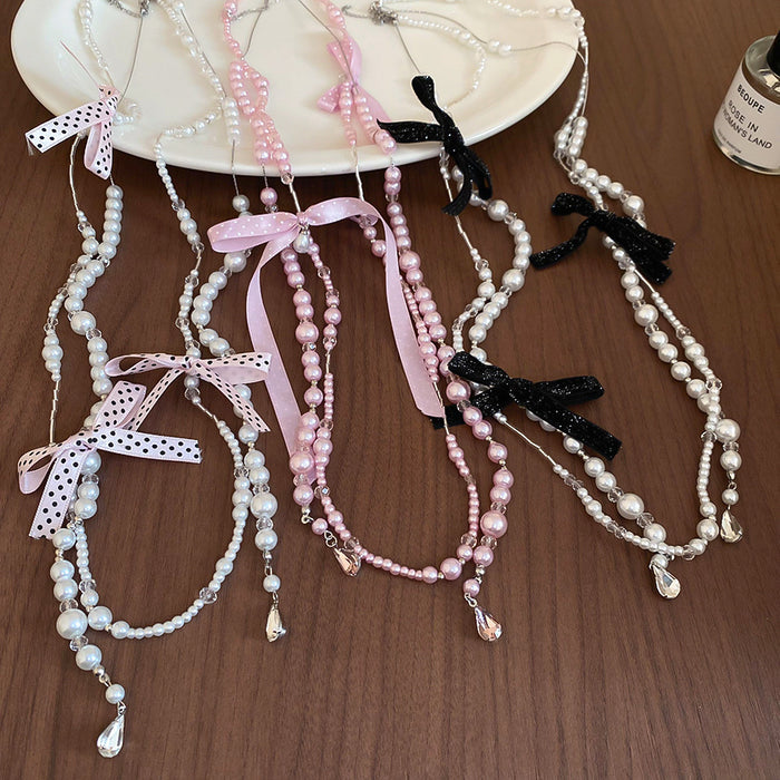 Chanel-inspired Butterfly-knot Necklace With A Sweet Long Design And Layered Pearl Accents - Fashionnsio