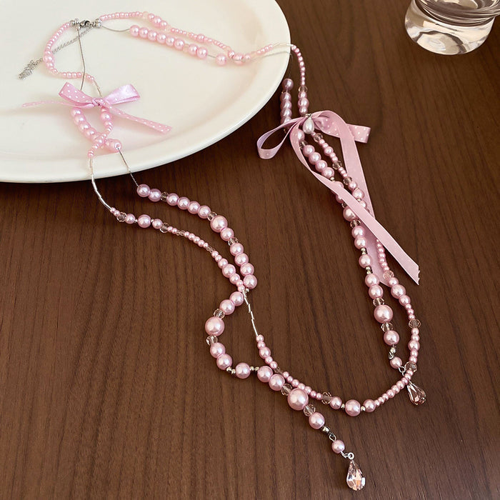 Chanel-inspired Butterfly-knot Necklace With A Sweet Long Design And Layered Pearl Accents - Fashionnsio