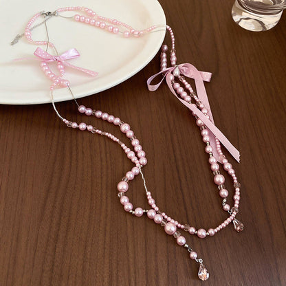 Chanel-inspired Butterfly-knot Necklace With A Sweet Long Design And Layered Pearl Accents - Fashionnsio