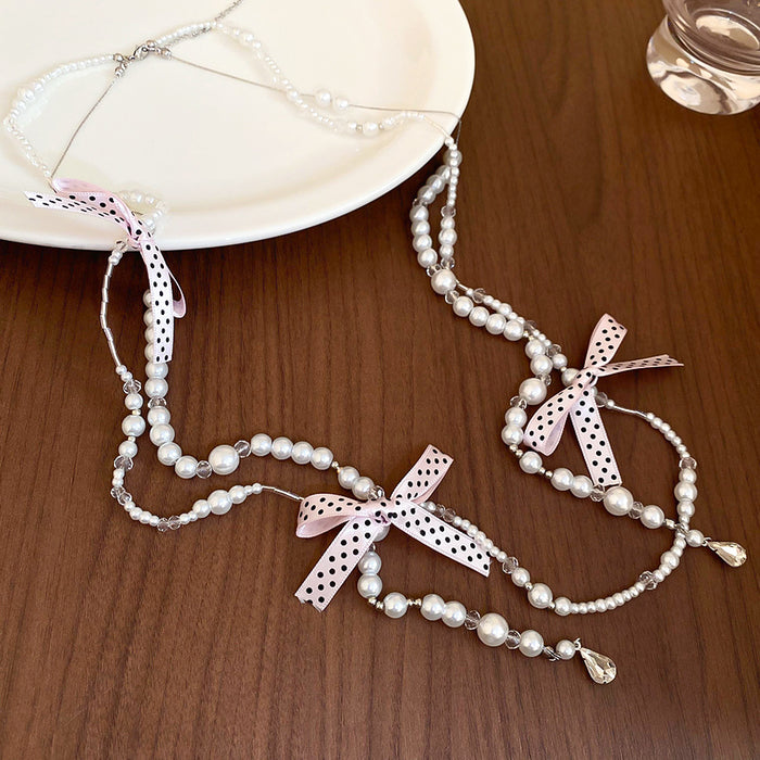 Chanel-inspired Butterfly-knot Necklace With A Sweet Long Design And Layered Pearl Accents - Fashionnsio