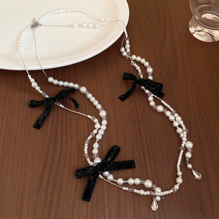 Chanel-inspired Butterfly-knot Necklace With A Sweet Long Design And Layered Pearl Accents - Fashionnsio