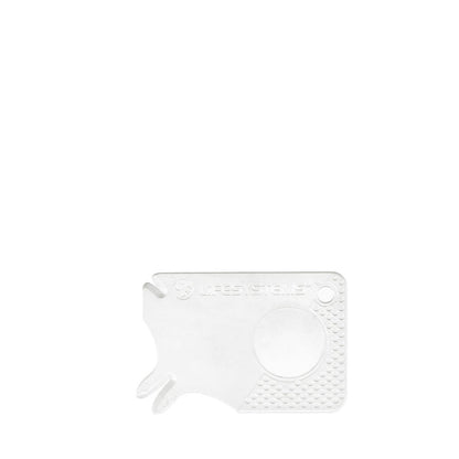 Lifesystems compact tick removal tool card photographed on a white background