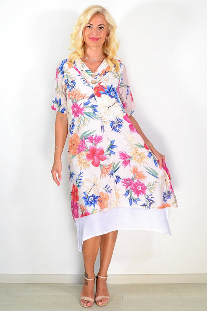 Light beige print summer tunic dress by La Mode, featuring a flowy fabric and casual style ideal for warm weather.