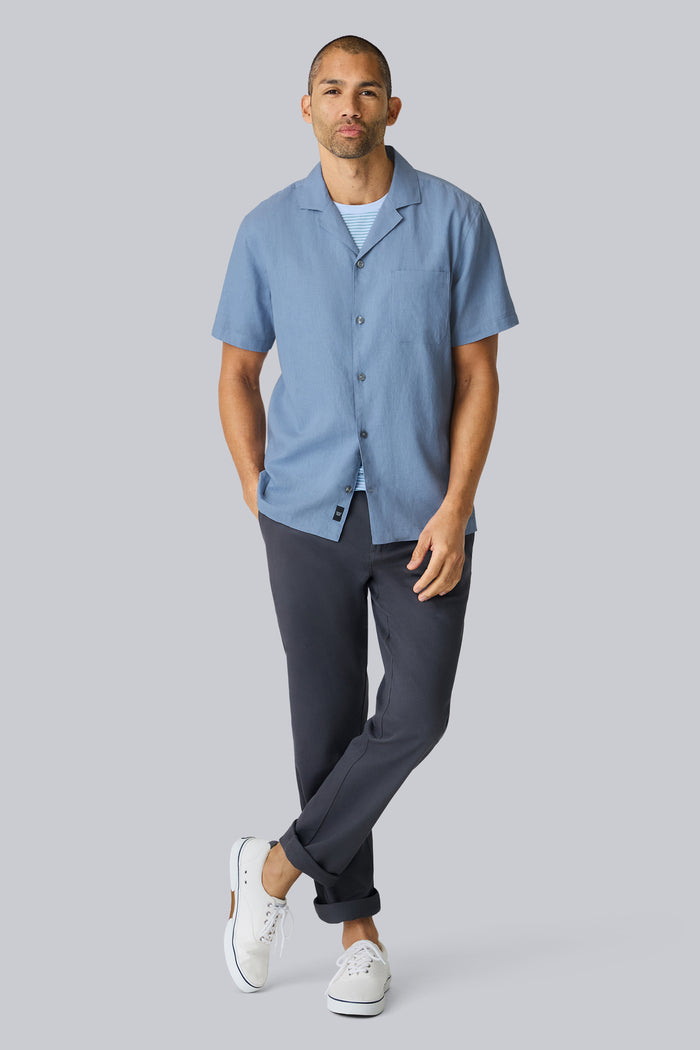 Full front view of a man wearing Linen Camp Shirt in Desert Spring