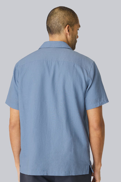 Back view of a man wearing Linen Camp Shirt in Desert Spring