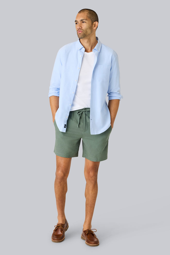 Full front view of a man wearing Linen Drawstring Short in Cactus