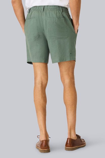 Back view of a man wearing Linen Drawstring Short in Cactus