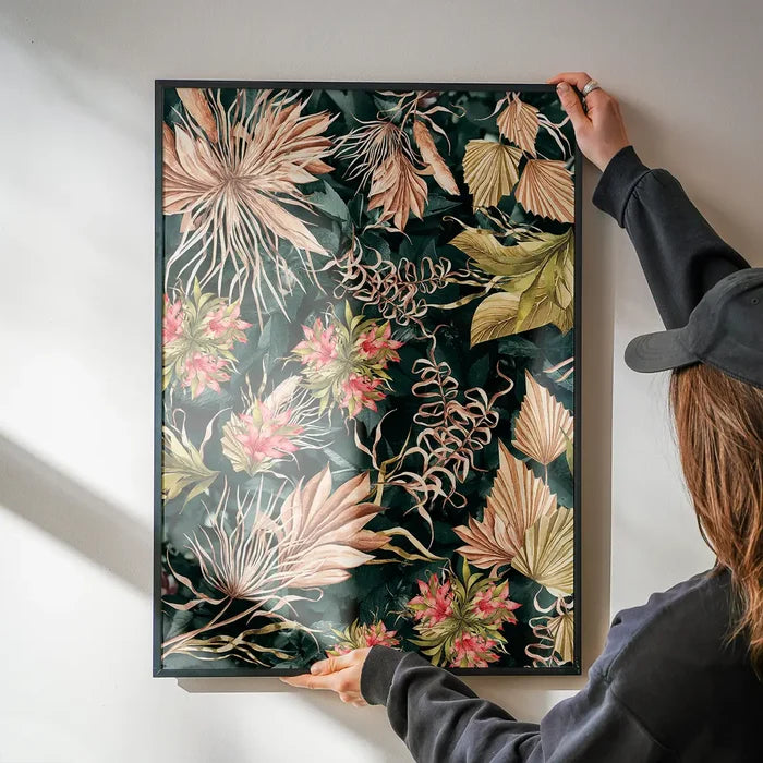 Maximalism Leaves Print 2 being hung on a wall in a black frame