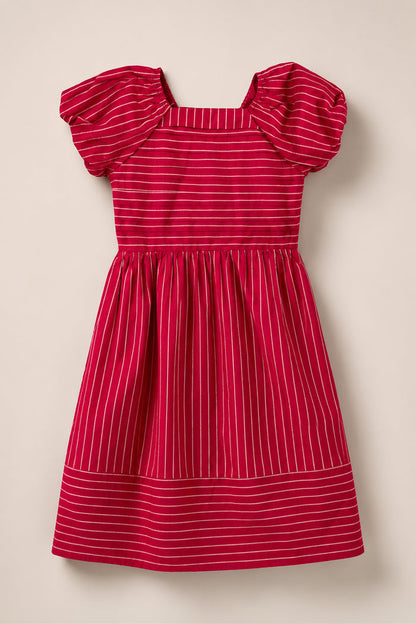 Mini Julie Dress in Cranberry Pinstripe by Ivy City Co, featuring white horizontal stripes, puff sleeves, a square neckline, smocked bodice, and gathered waist. The dress is laid flat on a light beige background.