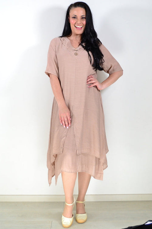 La Mode mocha summer tunic dress hanging on a mannequin with floral patterns and lightweight fabric.