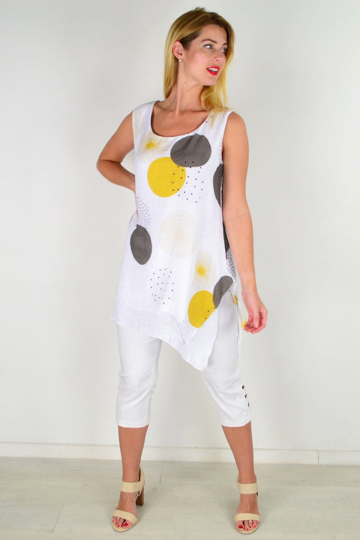 Mustard circle sleeveless tunic top by La Mode, displayed flat with round neckline and sleeveless design.