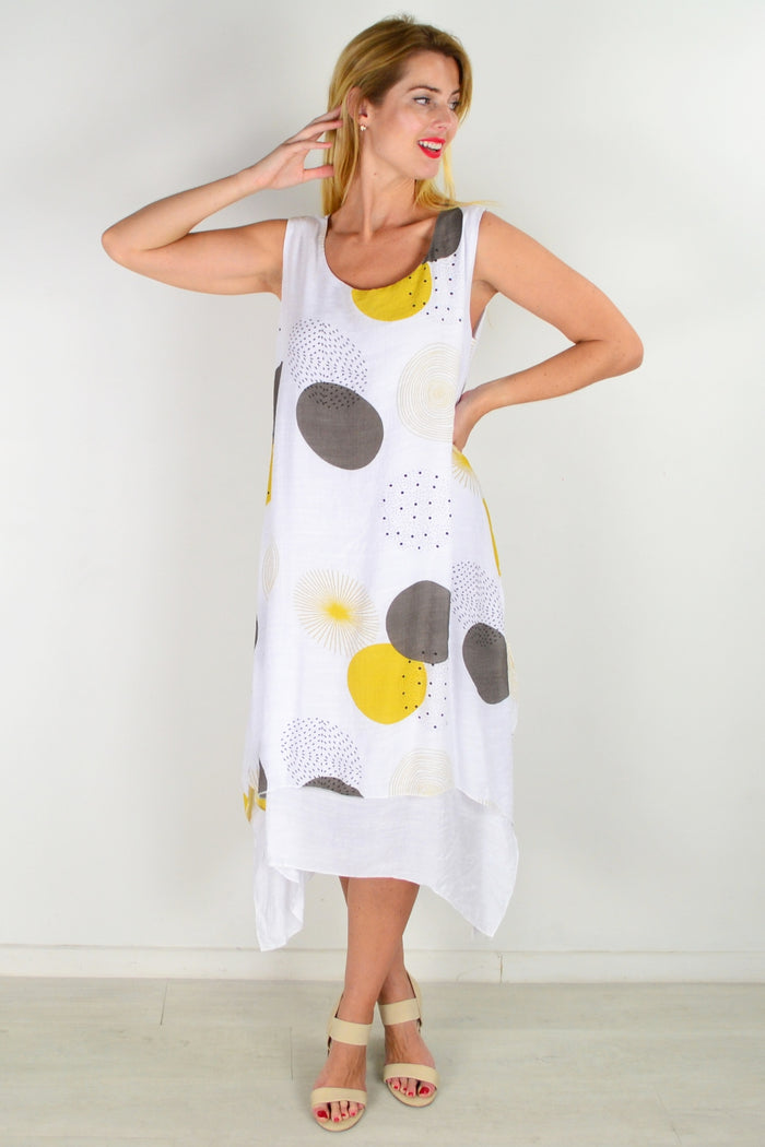 Mustard spot sleeveless tunic dress by La Mode, featuring a relaxed fit and lightweight fabric with playful print details.