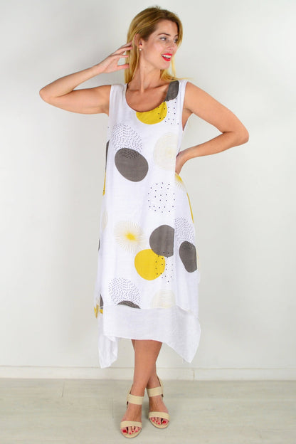 Mustard spot sleeveless tunic dress by La Mode, featuring a relaxed fit and lightweight fabric with playful print details.