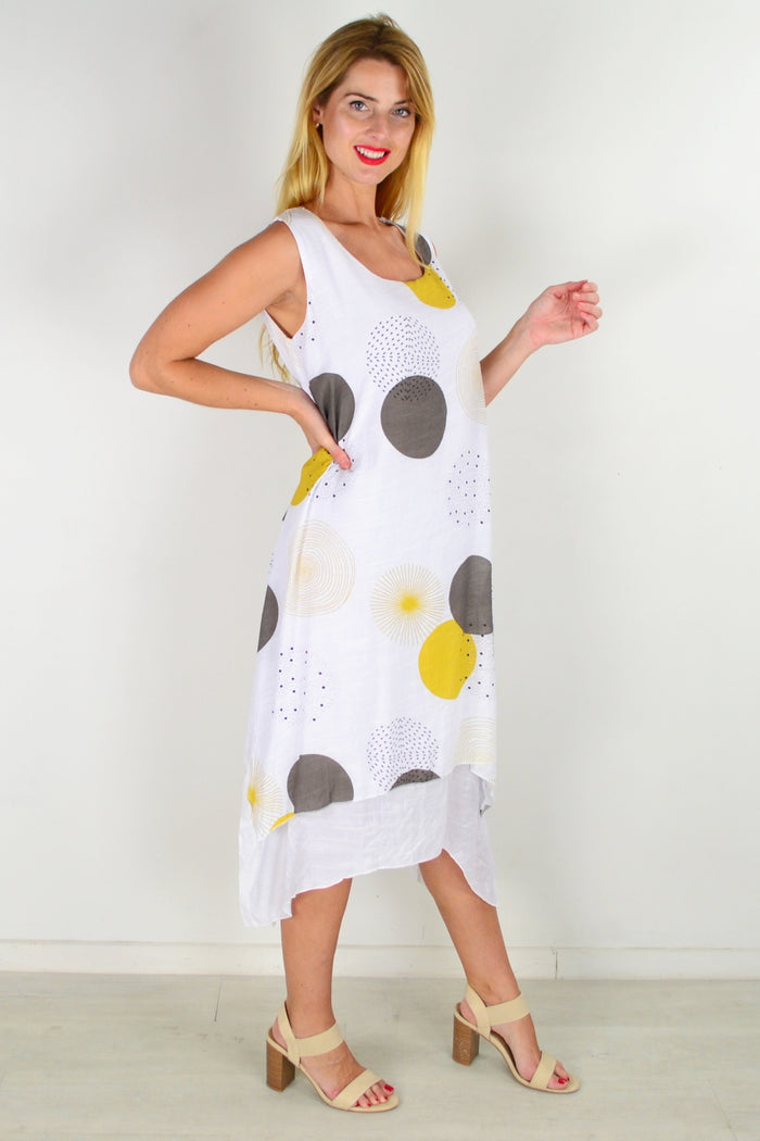 Mustard spot sleeveless tunic dress by La Mode, lightweight fabric with a relaxed fit and stylish design.