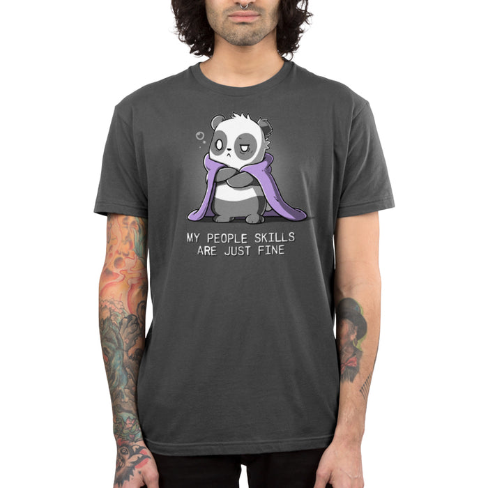 Premium Cotton T-shirt_TeeTurtle charcoal gray My People Skills Are Just Fine apparel featuring a panda crossing its arms, making a disgruntled face, and a purple blanket draped around its shoulders. Caption reads, "my people skills are just fine".