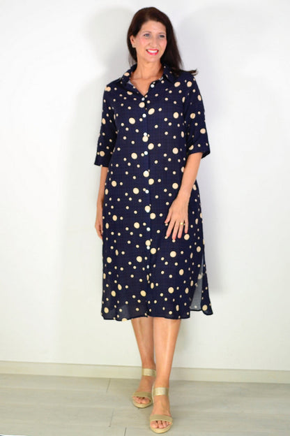 Navy spotted long tunic shirt by La Mode, featuring a relaxed fit and stylish pattern, displayed on a hanger.