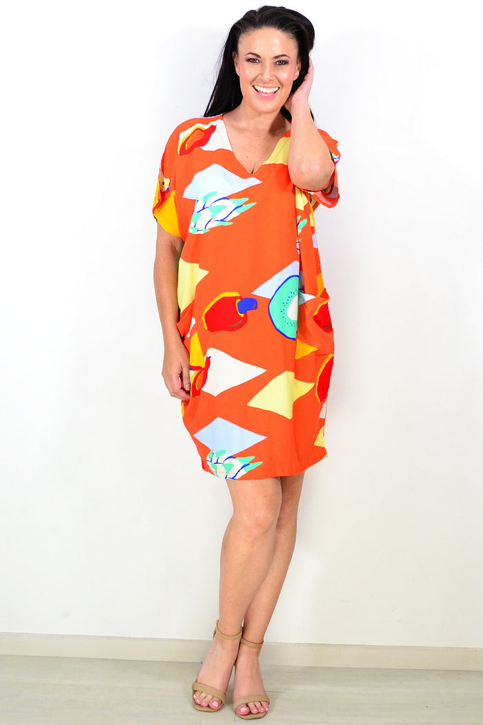 Orange Candy Lane Tunic Dress by Red Lotus, featuring a vibrant, flowy design with long sleeves and a relaxed fit.