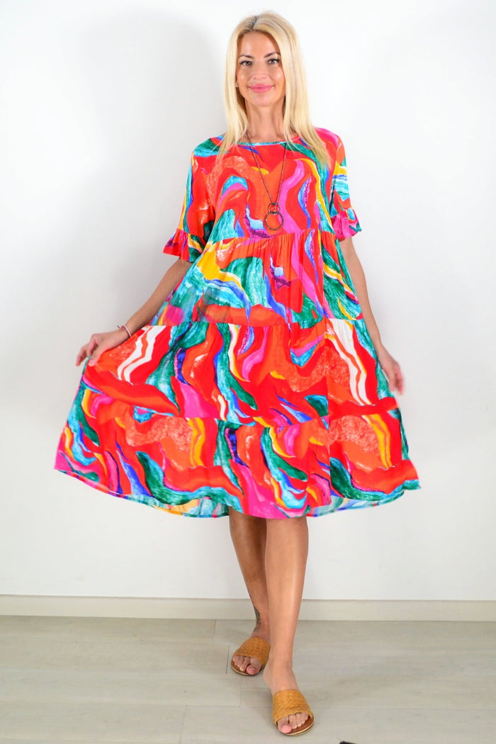 Orange and pink print tunic dress by Hourglass, featuring a stylish and comfortable design with vibrant patterns.
