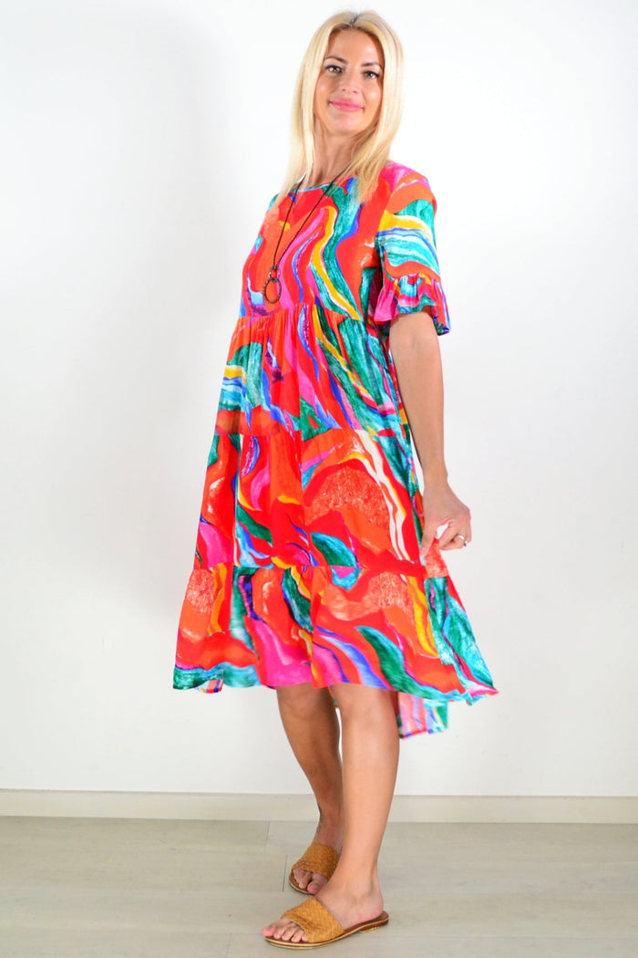 Orange and pink print tunic dress from Hourglass featuring a stylish, flowing design perfect for casual wear.