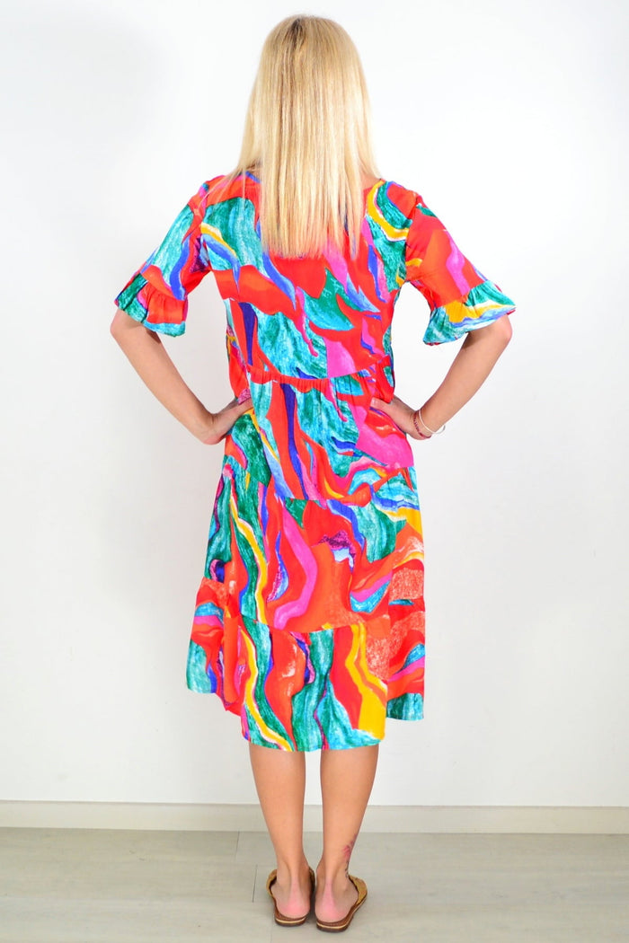 Orange pink print tunic dress by Hourglass featuring a vibrant, flowing design perfect for casual or summer wear.
