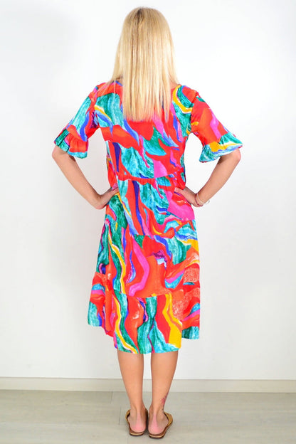 Orange pink print tunic dress by Hourglass featuring a vibrant, flowing design perfect for casual or summer wear.