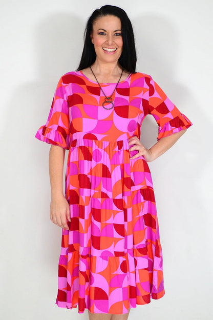 Orange and purple geometric midi dress tunic from New U Collection, featuring a stylish, modern design with bold patterns.