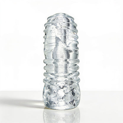 Palm-Tec LX20 Intense Stroker standing upright with a transparent textured exterior featuring raised rings and stimulating internal contours