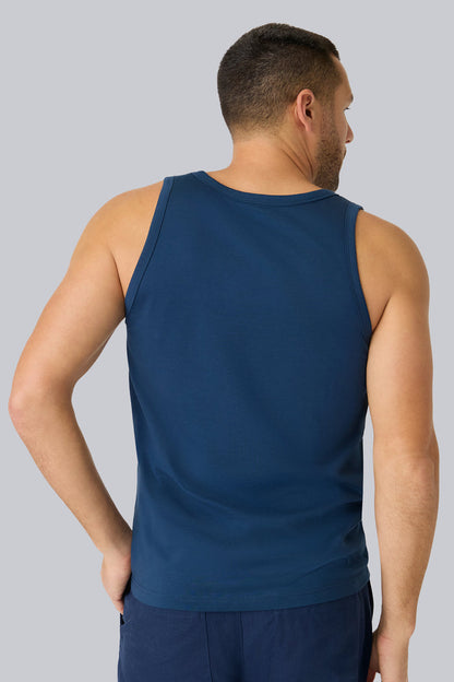Back view of a man wearing Pima Tank in True Navy