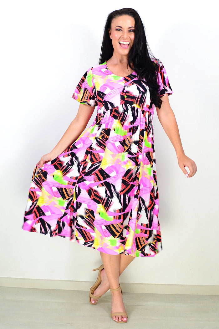 Pink and black abstract tunic dress by Hourglass featuring a flowing design and stylish pattern, perfect for casual or chic occasions.