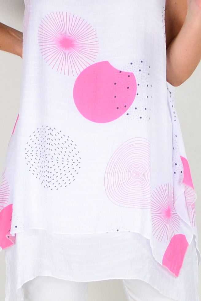 Pink circle sleeveless tunic top by La Mode, featuring a relaxed fit and stylish design, displayed on a hanger.