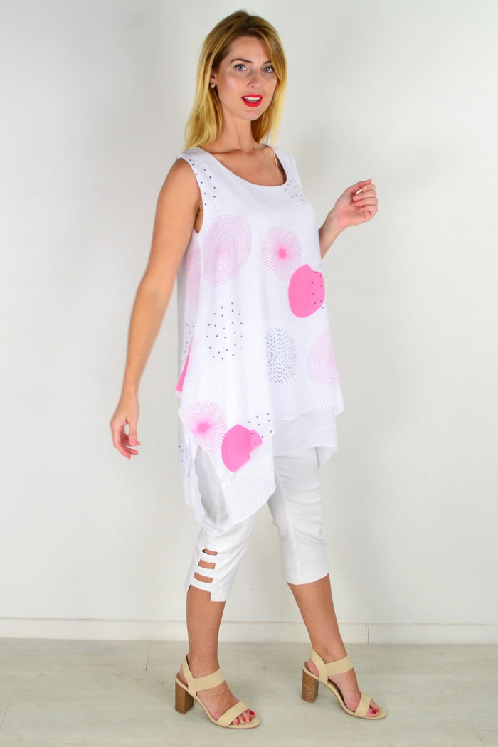 Pink circle sleeveless tunic top by La Mode, featuring a relaxed fit and stylish round neckline, displayed on a hanger.