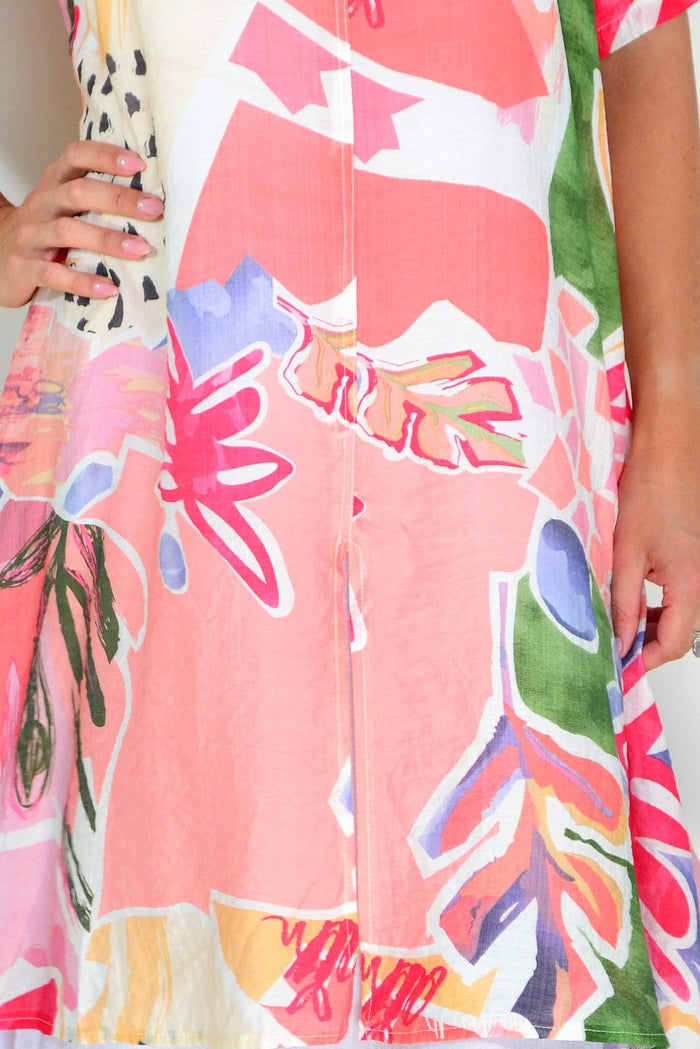Pink floral print summer tunic dress by La Mode, lightweight fabric with a relaxed fit and vibrant floral pattern.