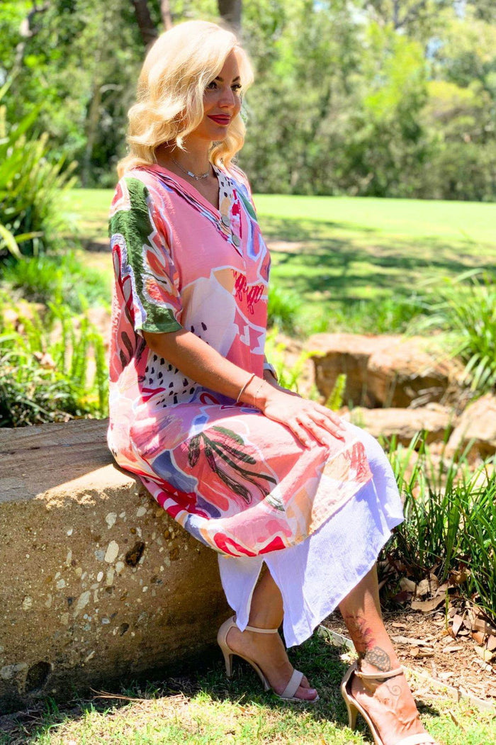 Pink floral print summer tunic dress by La Mode with lightweight fabric and relaxed fit, perfect for warm weather.