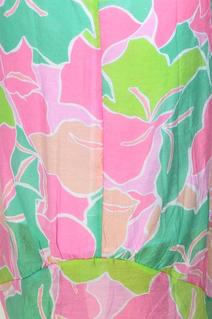 Pink Lime short sleeve tunic dress by Cali&Co featuring a relaxed fit and vibrant color, displayed on a hanger.