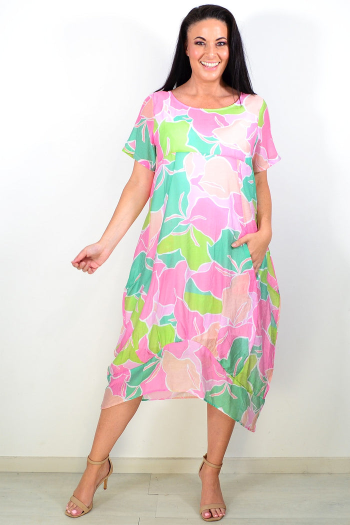 Pink Lime short sleeve tunic dress by Cali&Co featuring a relaxed fit and casual style, shown hanging on a neutral background.