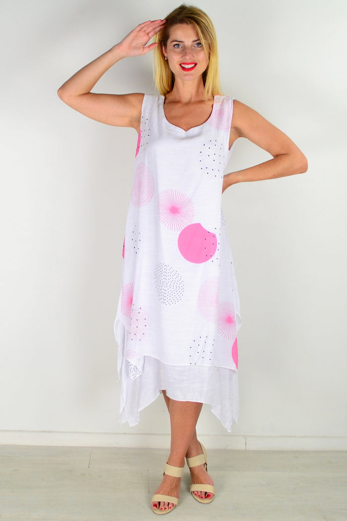 Pink spot sleeveless tunic dress by La Mode, featuring a relaxed fit and stylish design, displayed on a hanger.