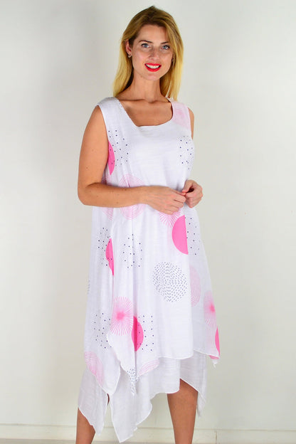 Pink spot sleeveless tunic dress by La Mode, showing a flowy fabric with a round neckline and sleeveless design.