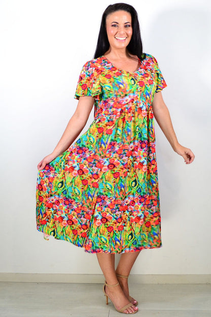 Hourglass Poppy Field Tunic Dress featuring a floral print, relaxed fit, and lightweight fabric perfect for casual wear.