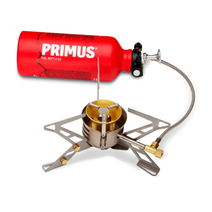 Primus Expedition Multifuel Stove with Ergo pump and 600ml fuel bottle attached on a white background