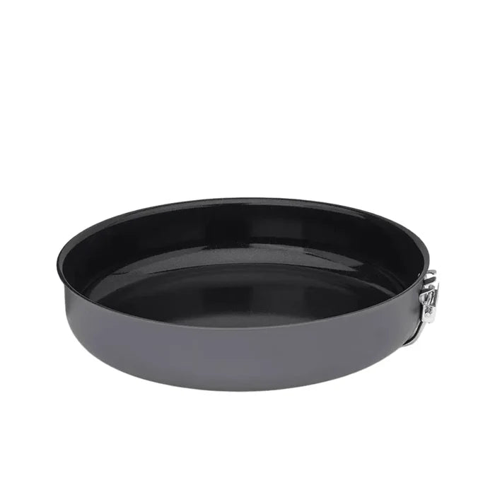 Small Primus Litech frying pan with the handle folded underneath showing the ceramic non-stick finish on a white background