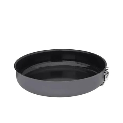 Small Primus Litech frying pan with the handle folded underneath showing the ceramic non-stick finish on a white background