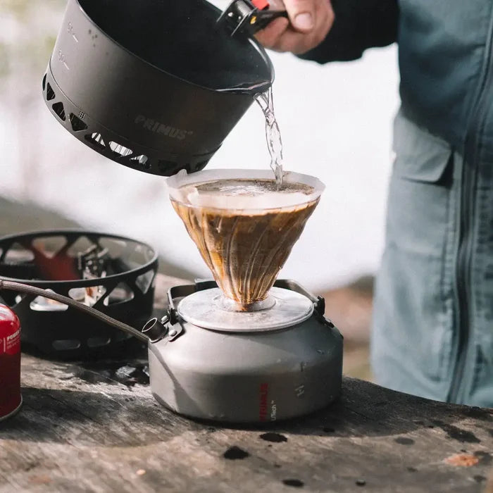 Primus Litech kettle 900ml version having hot water poured in to it via a coffee filter paper