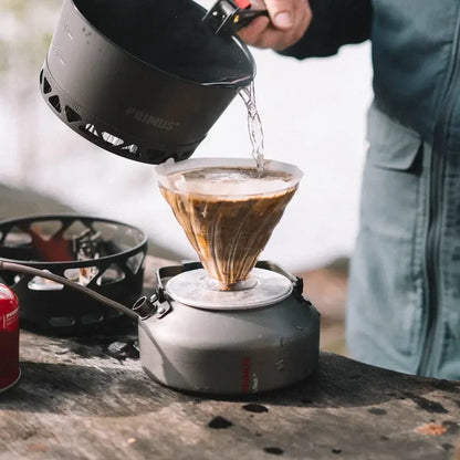 Primus Litech kettle 900ml version having hot water poured in to it via a coffee filter paper